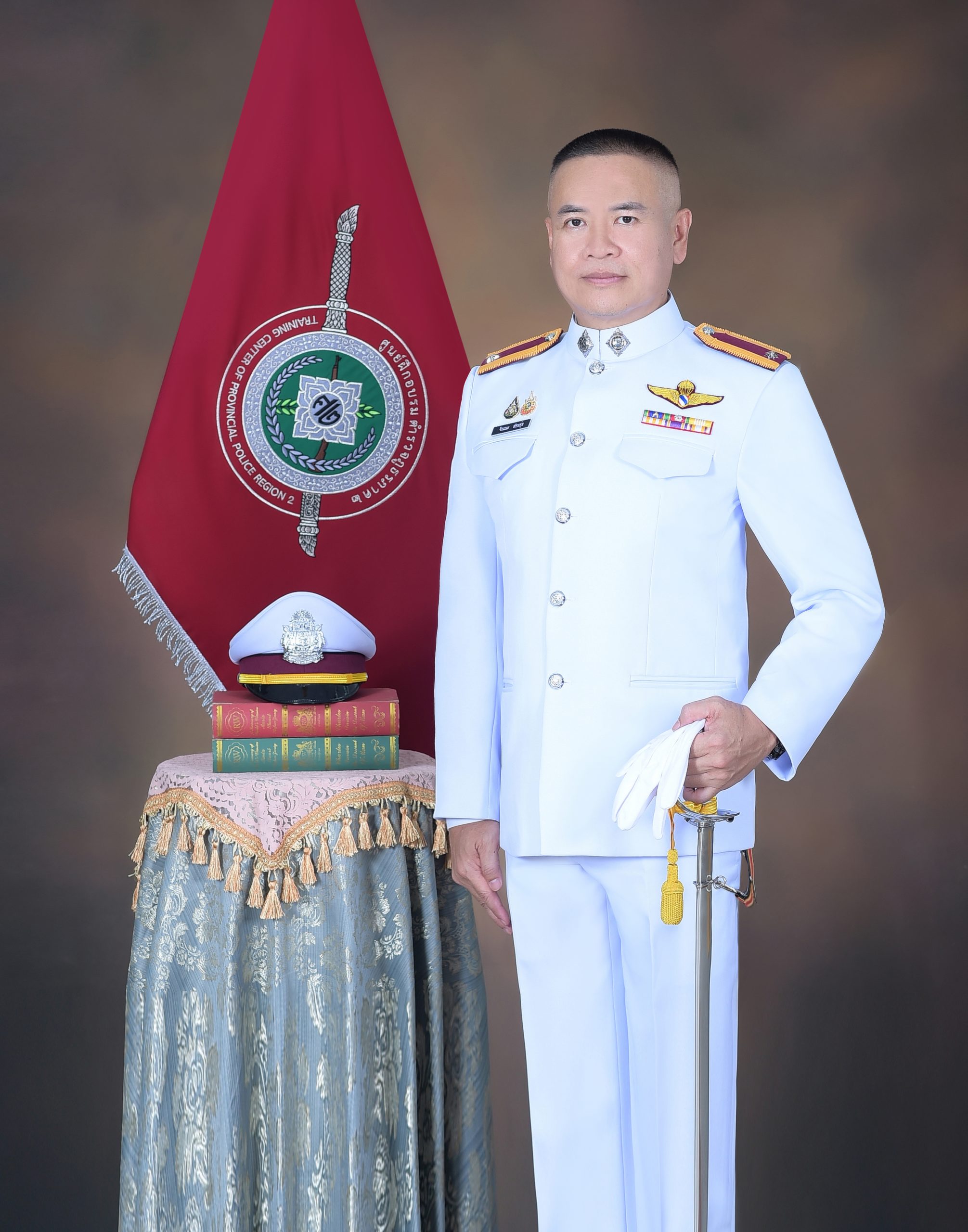 รูปภาพ ร.ต.ต.จิณณะ สอนอุ่น